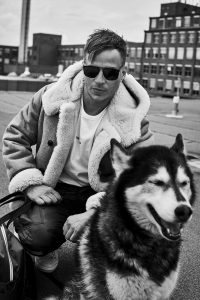 Tom Wlaschiha with husky dog